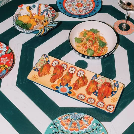 Painted plates with light dishes